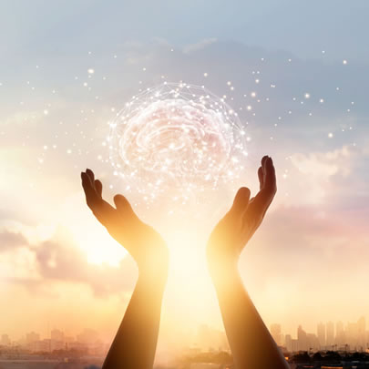 hands in the air towards sun